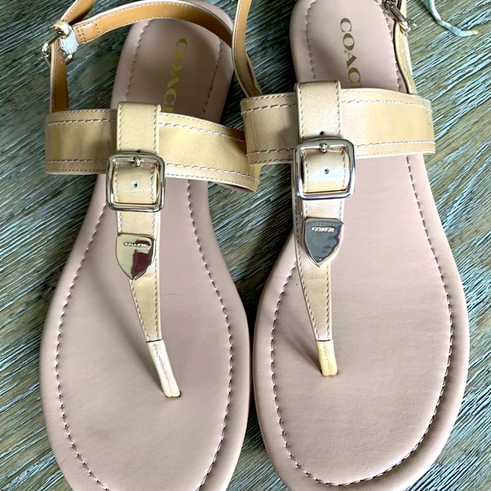 Coach flat sandals, Size 5, Color Tan, Pre Owned.